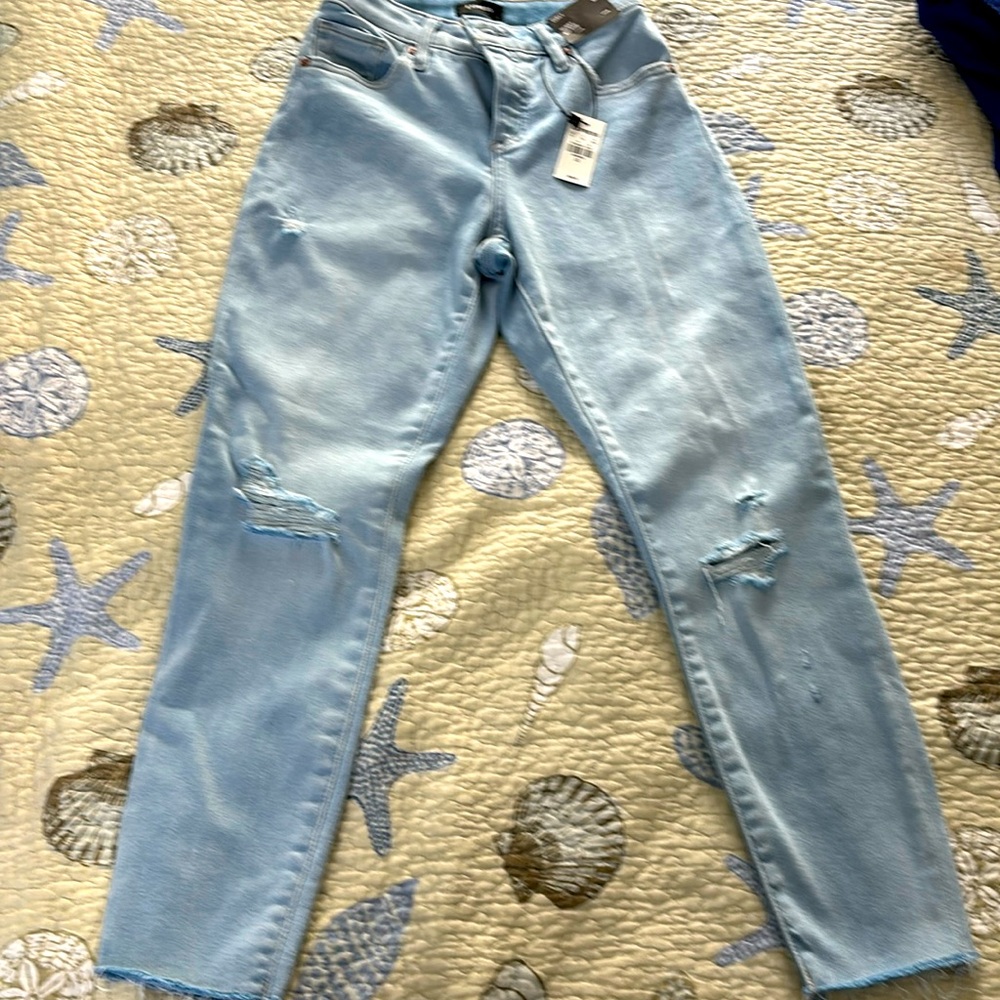 Express  curvy mid rise light wash ripped skinny jeans